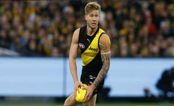 Australian Rules Football: Player banned after topless photo scandal