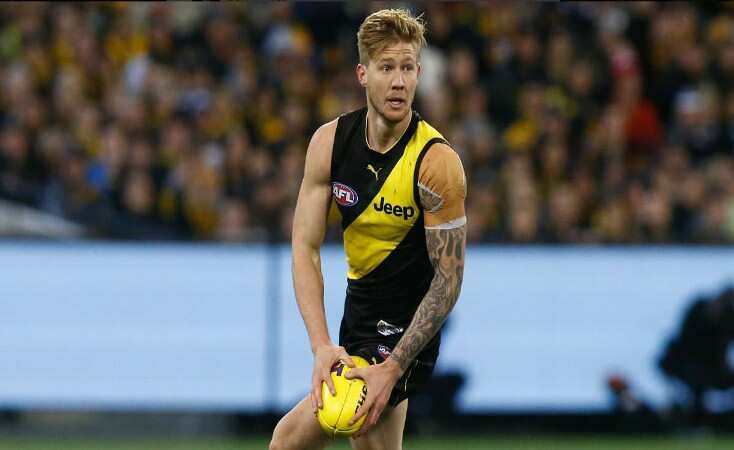 Australian Rules Football: Player banned after topless photo scandal