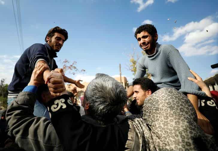 Escaped Syrian hostages from Islamic State receive rapturous homecoming. Escaped Syrian hostages from Islamic State receive rapturous homecoming.