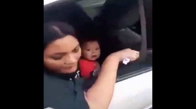 Watch: Mumbai cop tow car with sick woman breastfeeding baby