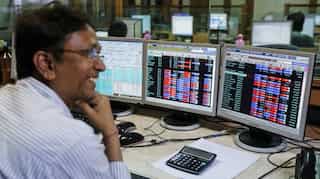 Sensex rises 103 points, RCom slumps