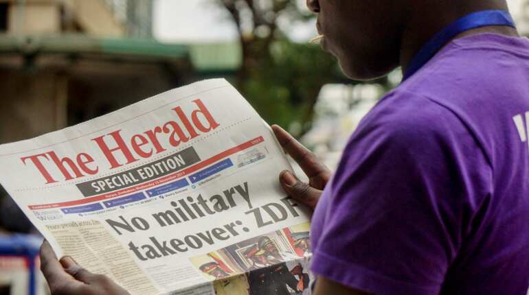 Main Zimbabwe newspaper completely misses news of coup