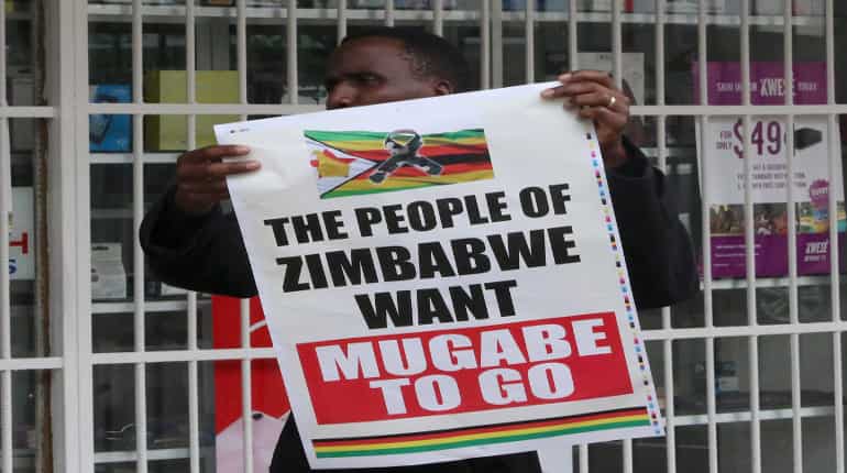 Party set to sack Mugabe, Zimbabweans celebrate expected downfall