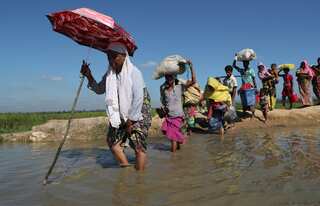 China willing to help solve Rohingya crisis: Foreign minister Wang Yi