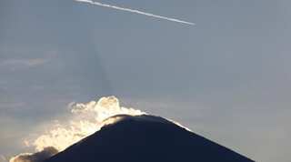 Bali volcano spews smoke and ash, raising eruption fears