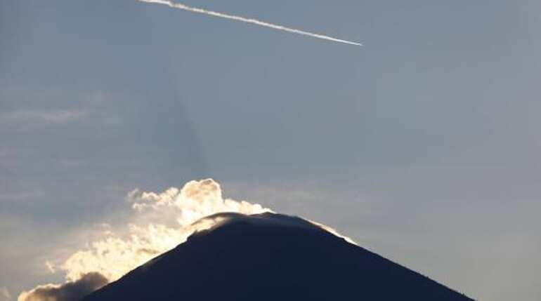 Bali volcano spews smoke and ash, raising eruption fears