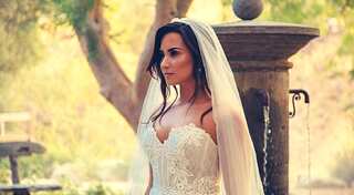 Demi Lovato shares photo of self in wedding gown, Twitter goes berserk