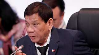 Journalist critical of Philippines' Duterte surrenders to face charges