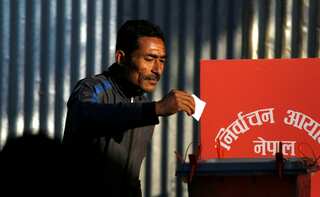 Nepal begins historic vote, army says 'rogue' Maoists behind blasts