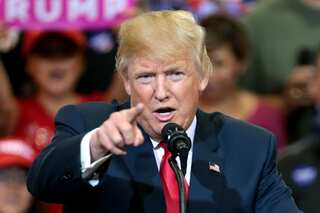Trump attacks British PM May after she criticises his retweeting of anti-Islam videos