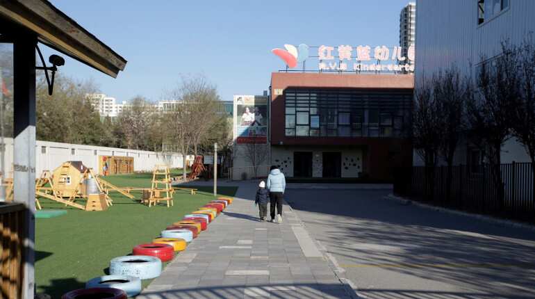 Beijing probes officials over daycare 'needle' scandal
