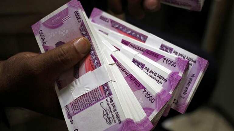 Rupee depreciates 18 paise to 69.89 against dollar as US-China trade concern weighs in