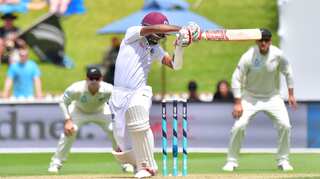 West Indies 214-2 at close, trail New Zealand by 172