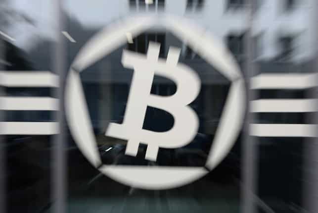 Bitcoin plummets more than 12 per cent to below $15,000