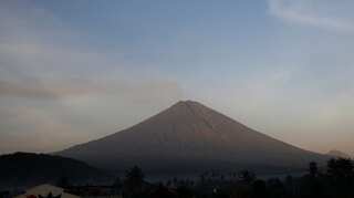 Ash billows from Bali volcano in fresh volley of activity
