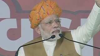 BJP was providing flood relief while Congress leaders relaxed in swimming pools, PM Modi in Gujarat rally