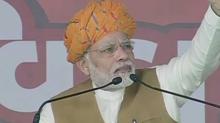 BJP was providing flood relief while Congress leaders relaxed in swimming pools, PM Modi in Gujarat rally