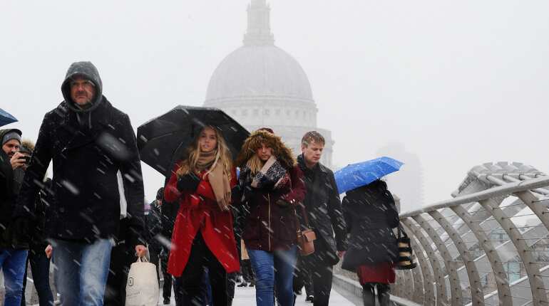 UK snowfall causes roads blocks, long power cuts