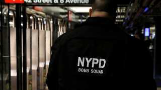 New York charges Manhattan bomb suspect with terrorism; Bangladesh questions wife