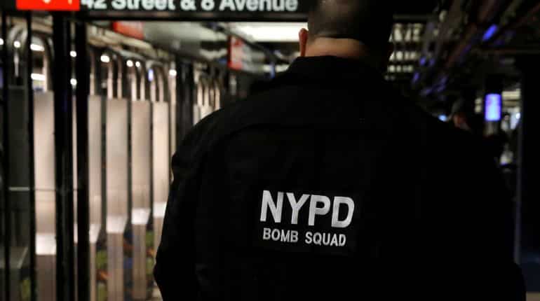 New York charges Manhattan bomb suspect with terrorism; Bangladesh questions wife