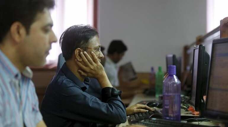 Sensex ends higher; Gujarat exit polls in focus