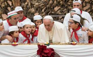Inside Pope Francis' 81st birthday celebrations - cake, balloons, and pizzas!