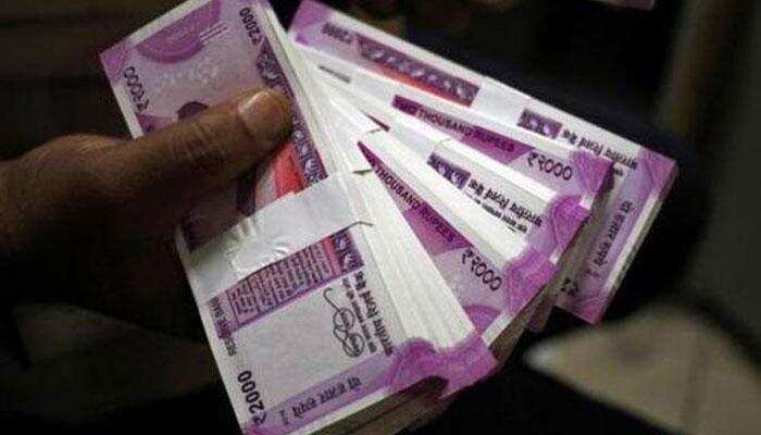 Sensex ends higher as Modi's party leads in state polls