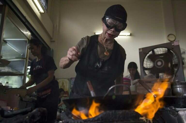 Thai street food cook wins Michelin star, feels the heat