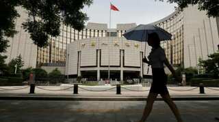 China needs Detroit-style bankruptcy as debt problems remain: Central bank official
