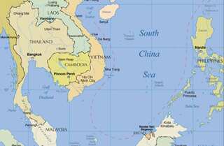 China vows 'necessary measures' after US warship enters South China Sea