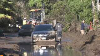 Rescuers search for victims as California mudslide toll hits 17