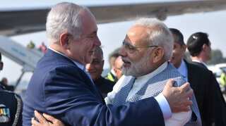 Congress releases video on PM Modi's 'hugplomacy', BJP slams it