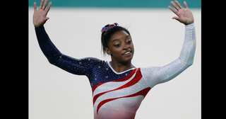 Brother of Simone Biles charged with triple murder