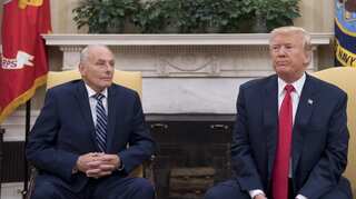 Trump aide says wall idea not 'informed'