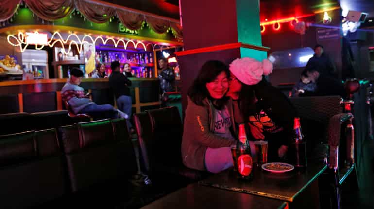 Dance bars, mobile phones and Chelsea jerseys: The changing face of Bhutan