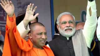 Pothole-free roads in UP to have 'saffron' boards with Narendra Modi, Yogi Adityanath pics