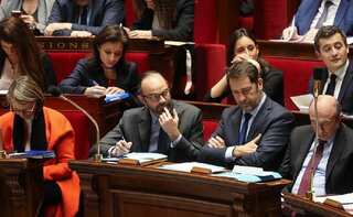 France's Parliament bans lawmakers from wearing religious symbols