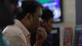 Sensex, Nifty tumble from record highs ahead of Budget