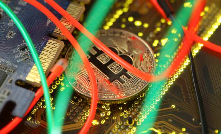 Bitcoin continues to slide, loses half its value in 2018