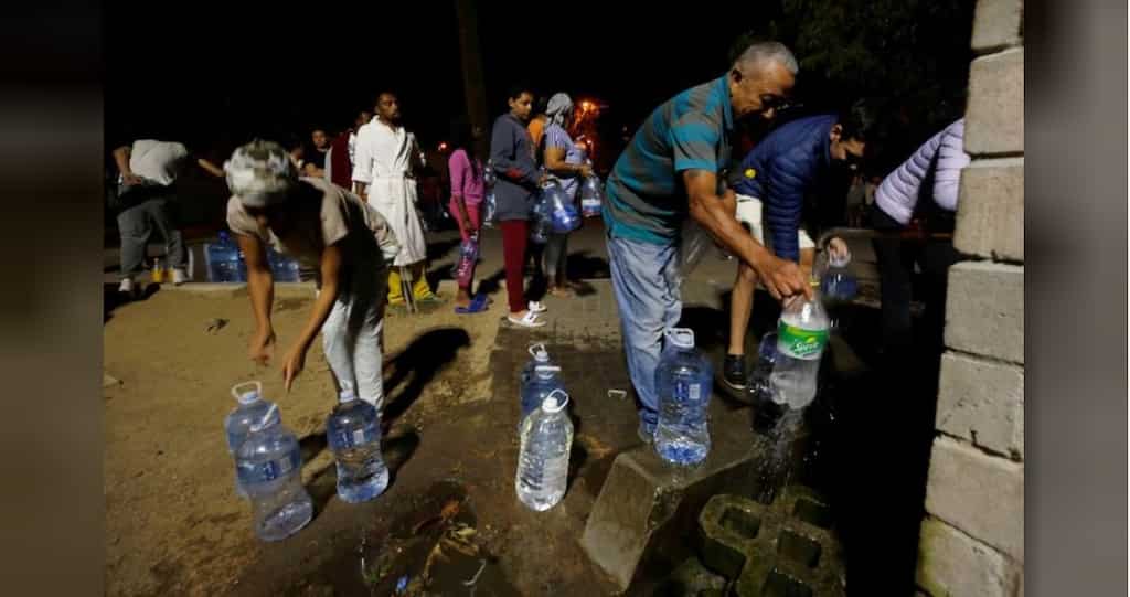 Drought forces some Cape Town residents into midnight queues for water
