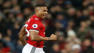 Football: Valencia urges United to stay in hunt for Premier League title