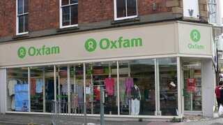 UK threatens to cut off aid cash to charities after Oxfam sex report