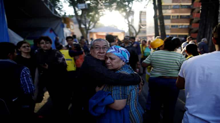 Mexico: 13 killed after helicopter crashes on two vans