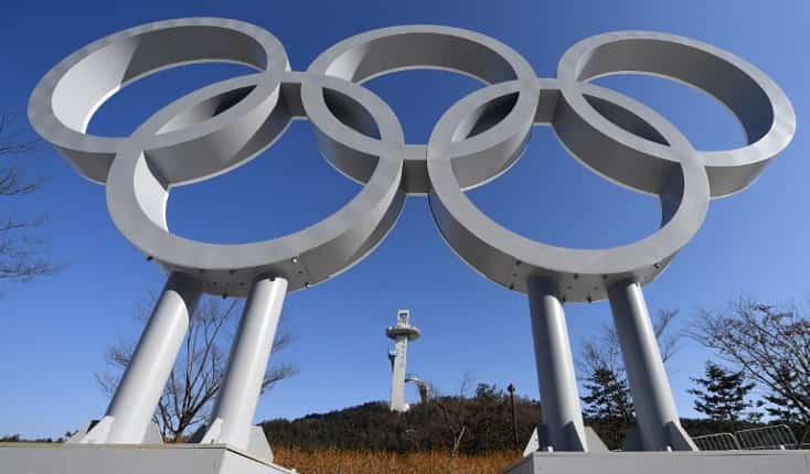 Beijing marks 100 days to Winter Olympics amid COVID-19, rights concerns