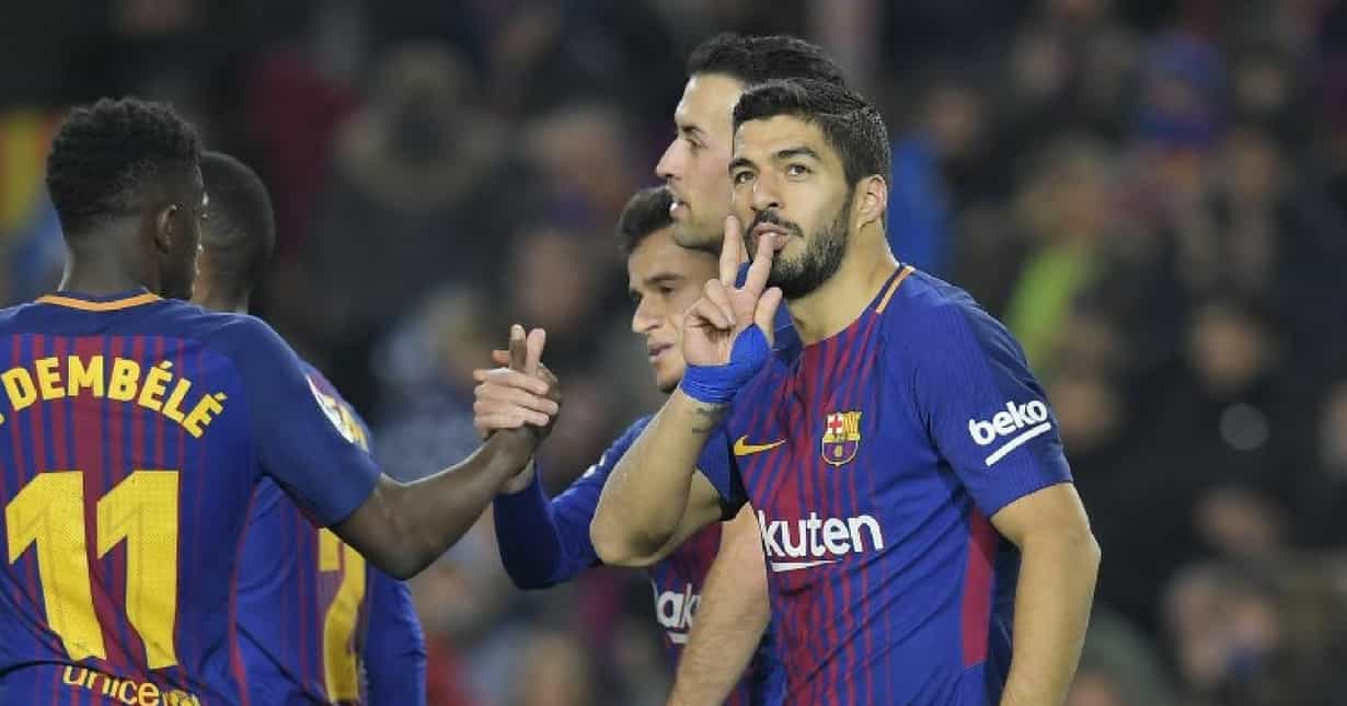 Suarez hat-trick extends six-goal Barca's La Liga lead