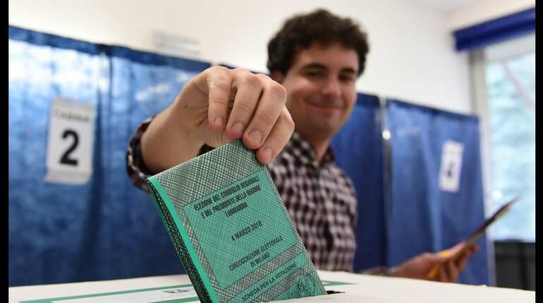 Italy votes in uncertain election stalked by populism