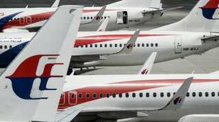 Not cleared for takeoff: passenger tied up after stripping naked