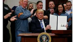 Trump signs sweeping tariffs; Canada, Mexico exempted