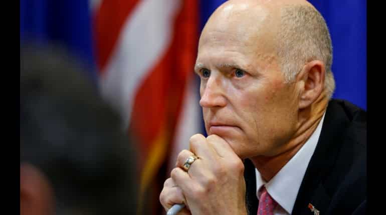Florida governor signs gun-safety bill into law after school shooting Florida governor signs gun-safety bill into law after school shooting