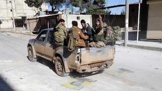 Turkish-backed rebels advance on Kurdish-held Syrian town